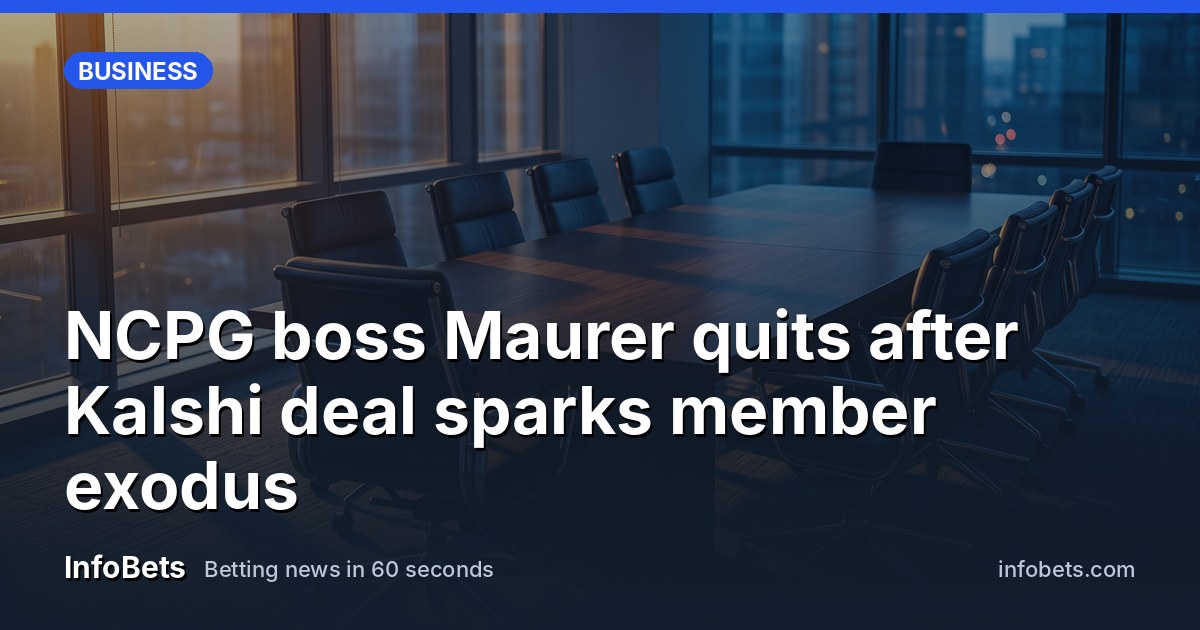 An empty boardroom table with chairs pushed in, lit by late afternoon light through tall windows.