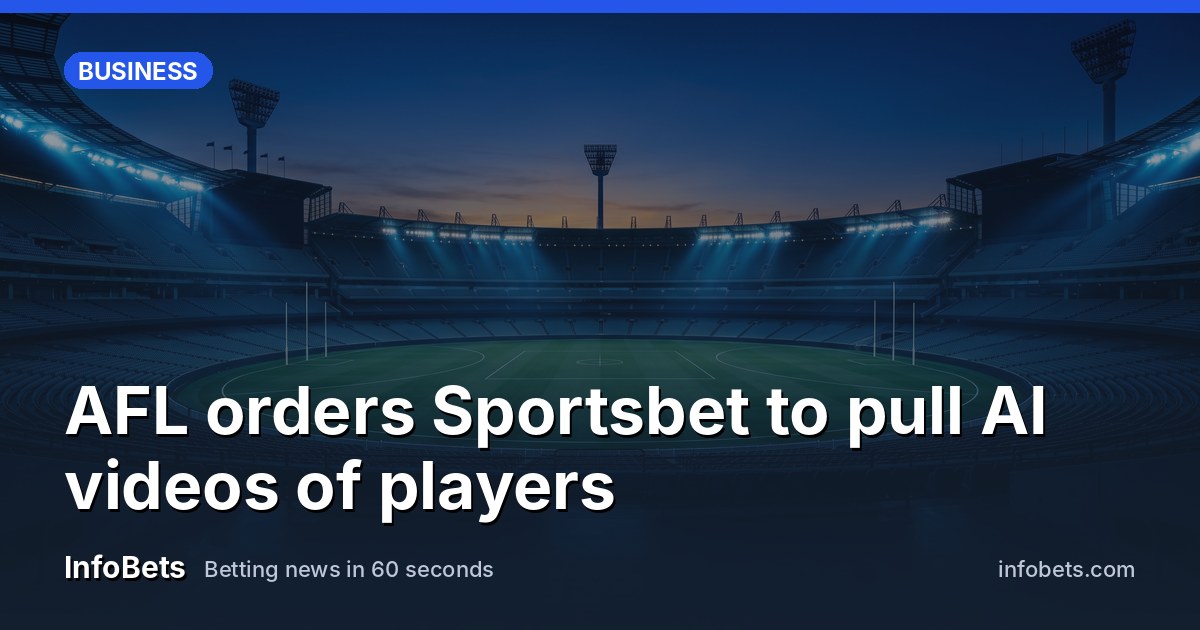 An empty Australian Rules football stadium at dusk with floodlights on & no crowd visible.