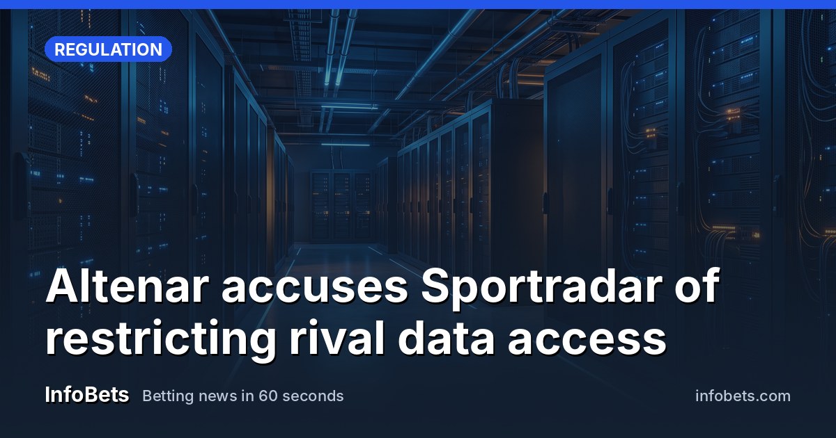 An empty data centre corridor lined with server racks under cool blue light.