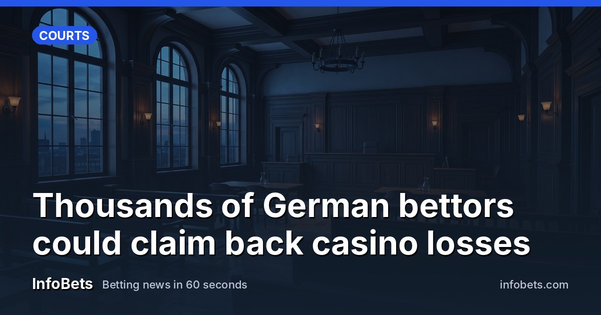 An empty German courtroom with tall windows & dark wood panelling at dusk.