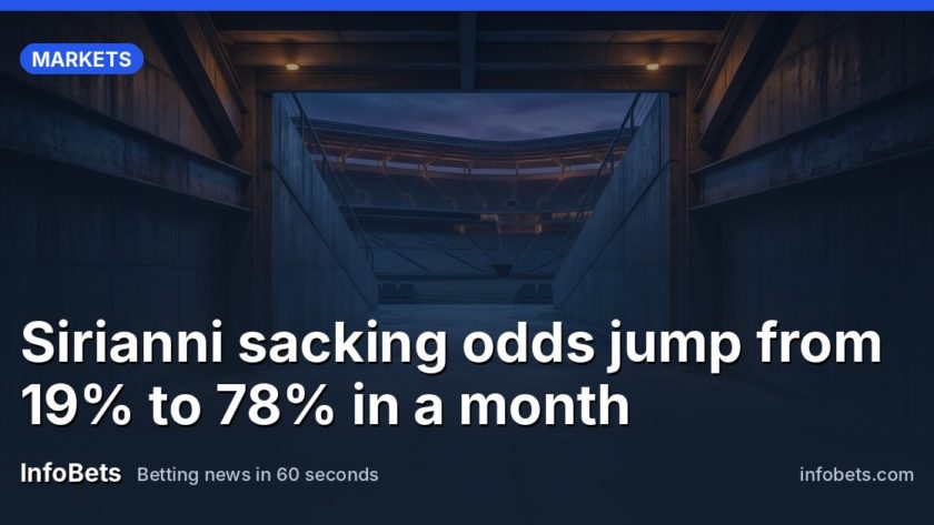 An empty NFL stadium tunnel at dusk, no markings visible, stands silent before kickoff.