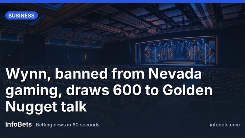 An empty casino showroom with rows of seats facing a lit stage, no people visible.