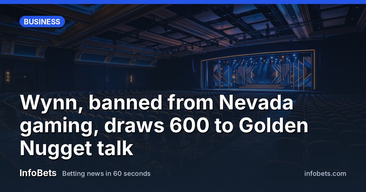 An empty casino showroom with rows of seats facing a lit stage, no people visible.